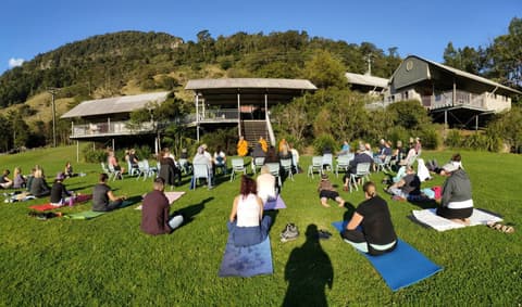 Meditation on the lawn beside the lodge
