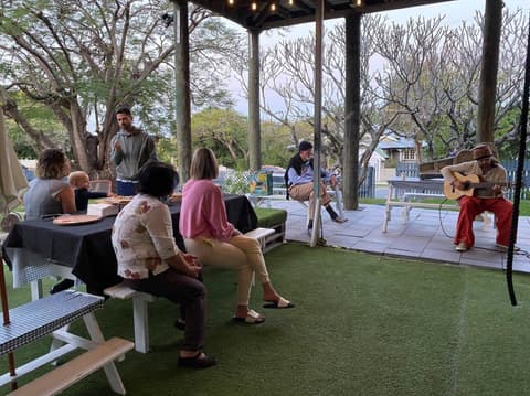 Sharing a meal under the pergola